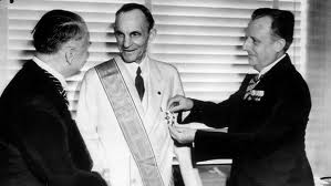 Henry Ford receiving the Grand Cross of the German Eagle in 1938